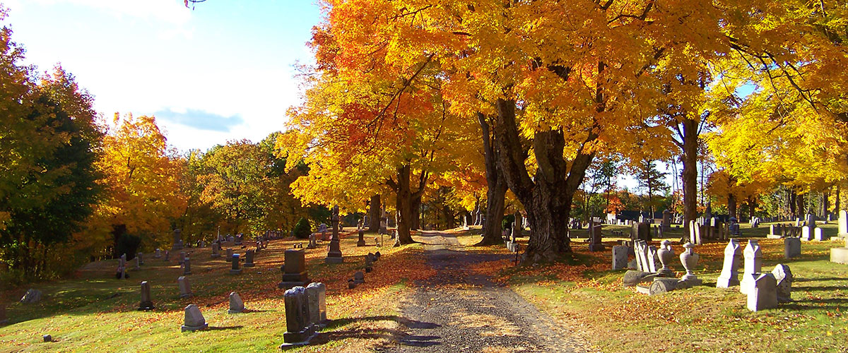 Cushing Academy Cemetery in Autumn with foliage